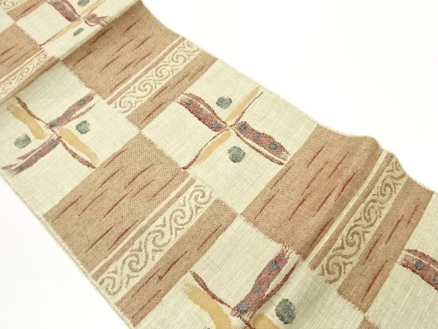 手織り真綿紬市松に抽象模様織出し名古屋帯